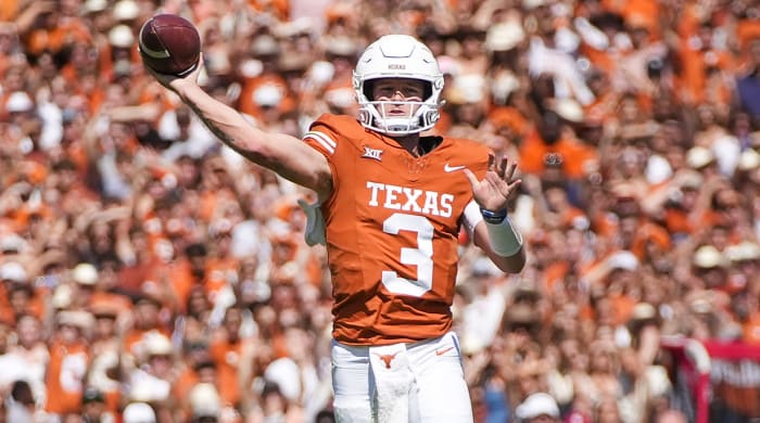 Texas Longhorns quarterback Quinn Ewers throws for a touchdown against the Oklahoma Sooners.